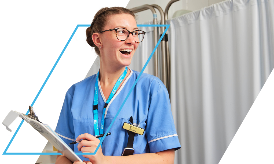 A nurse in uniform holding up a clipboard and a pen.