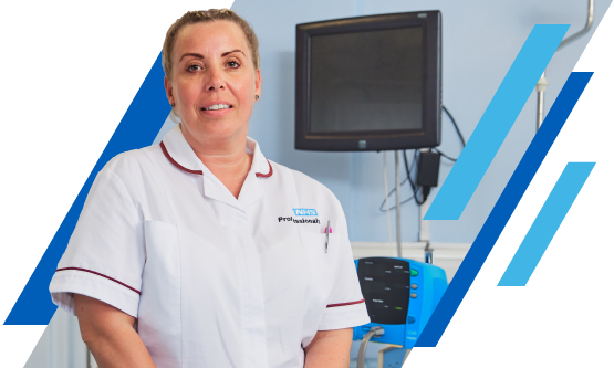 NHS Healthcare Support Worker standing in a hospital setting