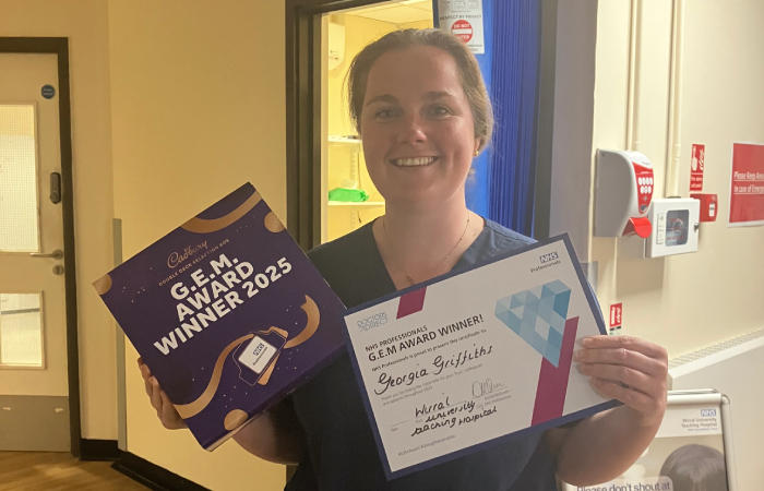 Georgia Griffiths from Wirral University Teaching Hospital NHS Foundation Trust holding their GEM Awards prize.